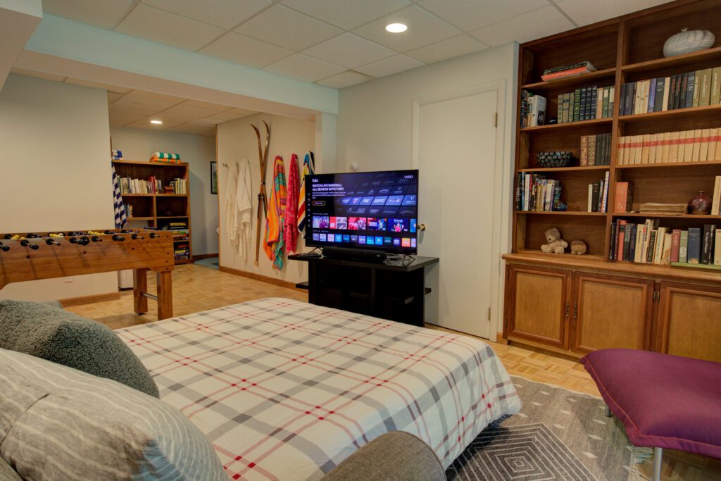 TTL Game Rm, books, TV, Foosball, Bed, Chair